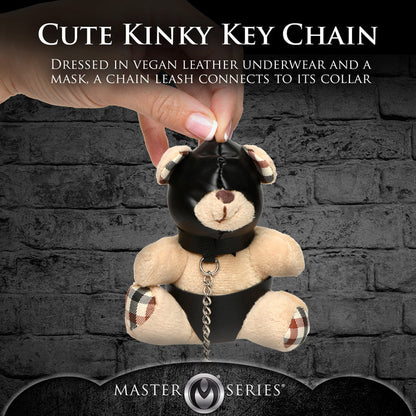 Light peach teddy bear keychain with hood, leather-look panties, and a chain leash, ideal as a gag gift or fun accessory.

hooded teddy bear keychain, BDSM bear keychain, gimp bear gift, bondage teddy bear keychain, kinky gag gifts, leather teddy keychain, teddy bear with chain leash, novelty bear keychain, gimp-themed teddy bear accessory, cheeky bondage gift.