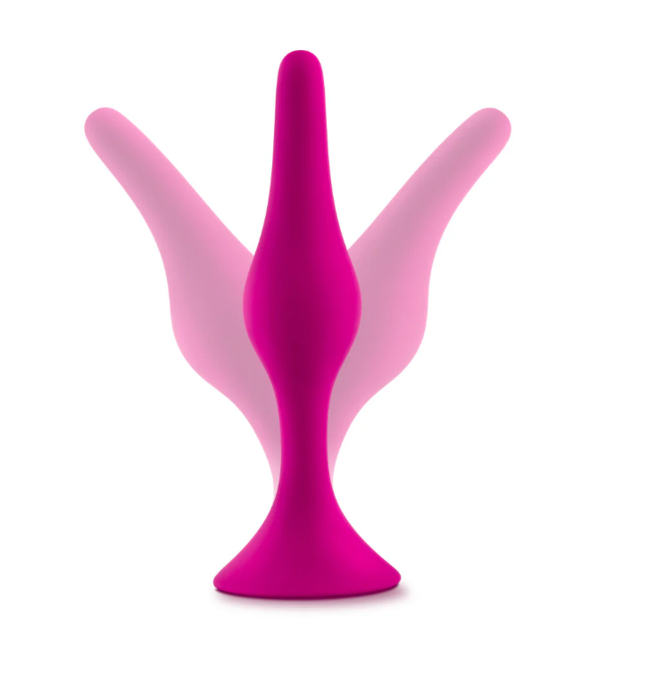 Luxe Beginner Plug Kit in Pink: Satin-smooth silicone, body-safe design, and three graduated sizes make this perfect for anal play beginners. Features tapered tips, suction cup bases, and easy-clean material.