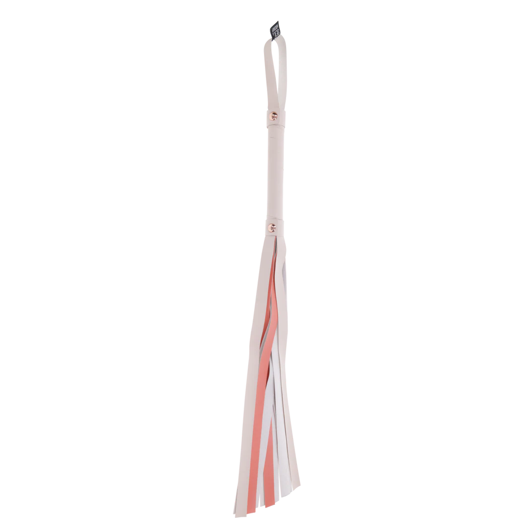 Peaches ‘n CreaMe Flogger: A playful flogger with 32-inch faux leather falls, a whimsical striped handle, and elegant rose gold accents. Perfect for flirty, teasing passion and satisfying strikes!