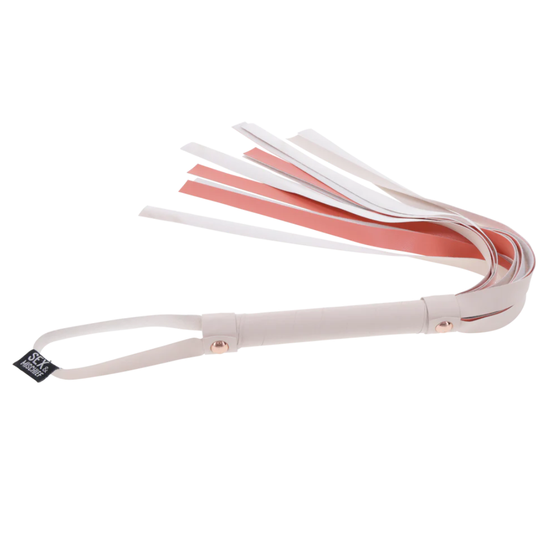 Peaches ‘n CreaMe Flogger: A playful flogger with 32-inch faux leather falls, a whimsical striped handle, and elegant rose gold accents. Perfect for flirty, teasing passion and satisfying strikes!