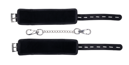 Edge® Handcuffs with padded black design, adjustable buckle closure, and removable metal tether for comfortable and secure BDSM play.