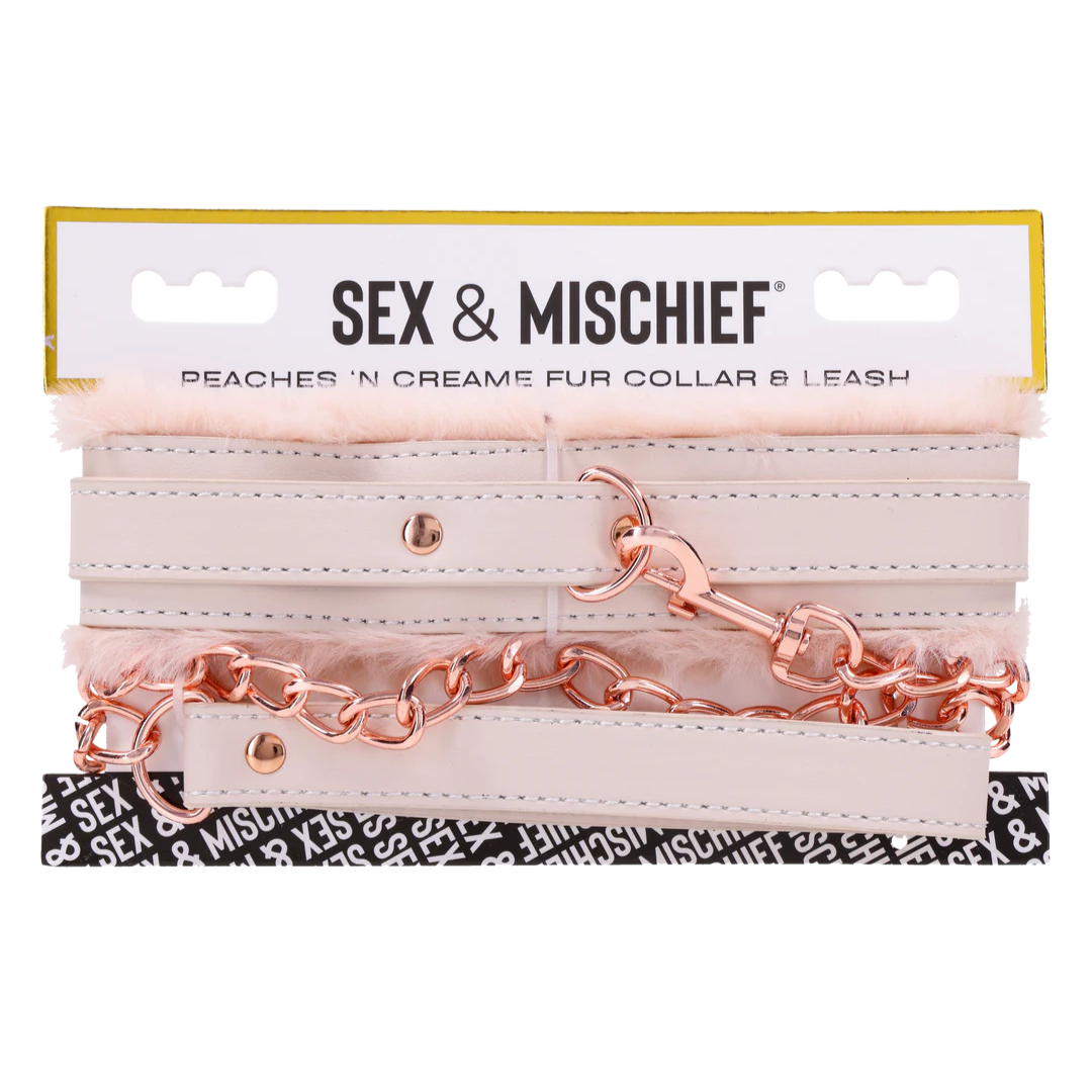 Luxurious peach-colored faux fur collar and leash set with rose gold hardware. Adjustable fit, detachable leash, and perfect for intimate power play or flirty fun.