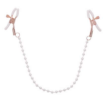 Rose gold nipple clamps with faux pearl accents. Adjustable design with white rubber tips to enhance sensitivity. Hypoallergenic and nickel-free for safe, stylish play.
