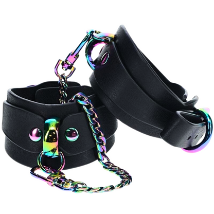 Black bonded leather handcuffs with iridescent hardware and a rainbow chain, designed for stylish BDSM restraint.