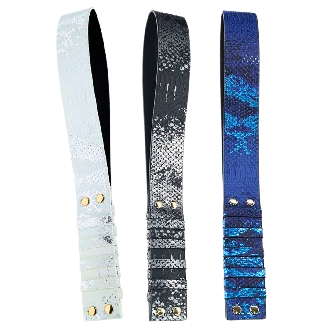 Textured bonded leather paddle with gold-tone accents, available in blue, black, and white, designed for stylish BDSM play.