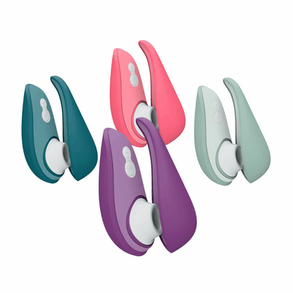 Womanizer Liberty 2 in sage green, dark petrol green, rose pink, and plum purple, featuring Pleasure Air Technology™, 8 intensity levels, magnetic travel cover, and waterproof design.

