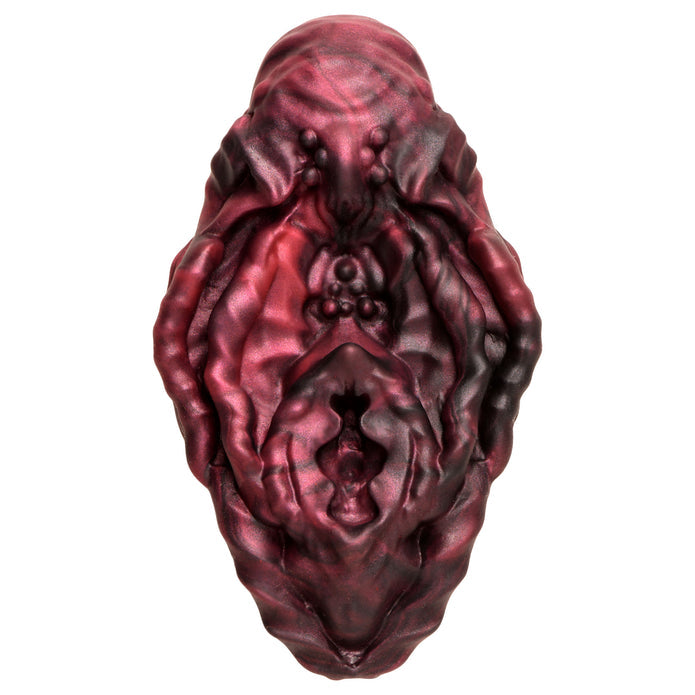 Squishy red and black alien vulva grinder with textured design for non-penetrative pleasure.

Xeno vulva, alien vulva grinder, non-penetrative pleasure, textured grinder, fantasy pleasure toy, red and black vulva, squishy silicone toy, body-safe silicone, phthalate-free grinder, erogenous zone toy, water-based lube friendly, alien roleplay toy