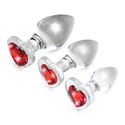 Clear glass anal plug with a red heart-shaped base, available in Small, Medium, or Large, designed for temperature play and smooth, comfortable insertion.

Booty Sparks red heart plug, glass anal plug, heart-shaped anal plug, temperature play anal plug, small glass anal plug, medium glass anal plug, large glass anal plug, red heart butt plug, hypoallergenic anal toy, romantic anal toy