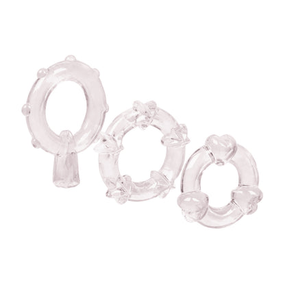 Magic C-Rings in Clear, Red, or Blue with heart and star-shaped pleasure nodules, made of soft TPR for enhanced stamina and stimulation.

erection enhancer rings, stretchy cock rings, heart and star-shaped cock rings, TPR cock rings, phthalate-free erection rings, stamina-boosting cock rings, reusable cock rings, waterproof enhancer rings, textured cock rings.