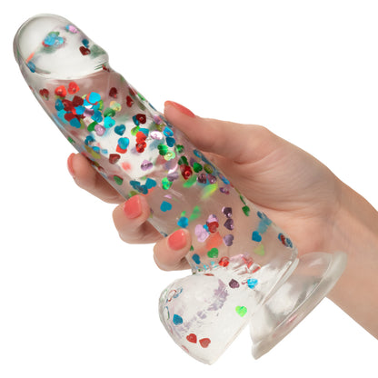 Naughty Bits™ I Love Dick Heart Filled Dong with sparkling heart confetti, suction cup base, and life-like design.
heart confetti dildo, life-like suction cup dong, harness-compatible dildo, TPR material sex toy, waterproof dildo, realistic dong, playful stylish dildo, compact 6-inch dildo, sparkling heart-filled dong