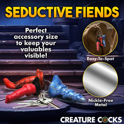 Set of 3 mini fantasy dildo keychains featuring Hell-Hound, Lord Kraken, and King Cobra designs.

fantasy dildo keychain, mini dildo keychains, Creature Cocks keychain set, Hell-Hound keychain, Lord Kraken keychain, King Cobra keychain, novelty fantasy dongs, body-safe silicone keychains, nickel-free keychains, kinky accessories