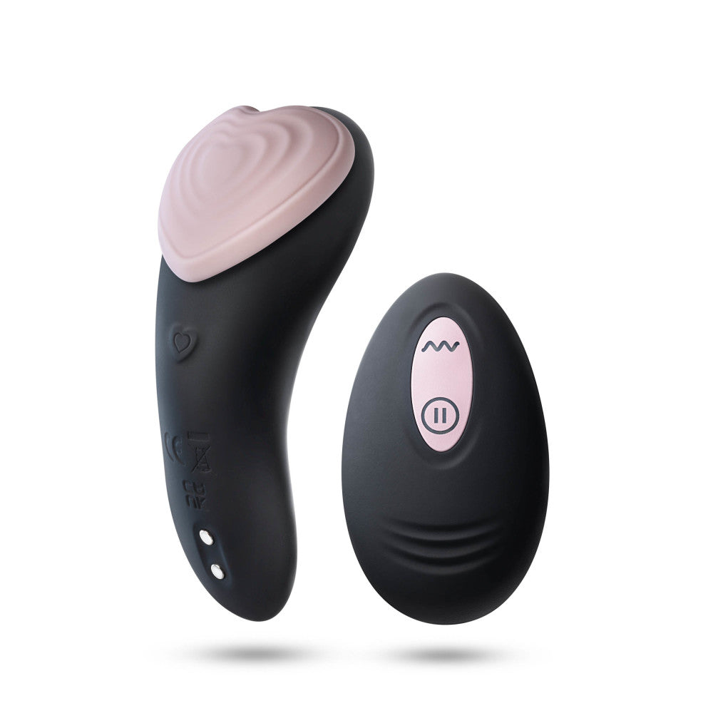 Temptasia Heartbeat Panty Vibrator in pink with wireless remote, magnetic attachment, and silky platinum-cured silicone design.
Keywords: panty vibrator, wireless remote vibrator, wearable vibrator, discreet vibrator, magnetic panty vibrator, portable sex toy, silicone vibrator, USB rechargeable vibrator, hands-free vibrator, body-safe sex toy.