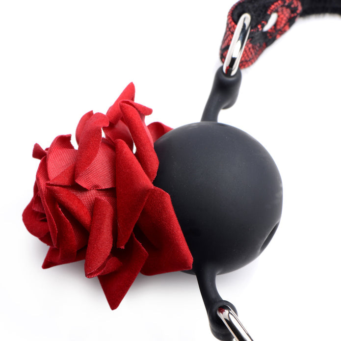 Master Series Silicone Ball Gag with a red rose accent, breathable silicone ball, adjustable lace strap, and soft inner lining.

Master Series ball gag, rose ball gag, breathable silicone gag, red and black lace gag, adjustable BDSM gag, realistic rose gag, soft inner lining gag, bondage accessories, floral ball gag, premium silicone gag.