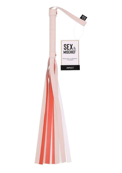 Peaches n CreaMe Flogger, peach flogger, faux leather flogger, 32-inch BDSM flogger, rose gold accents flogger, elegant BDSM accessories, teasing flogger, playful passion flogger, stylish flogger, striped handle flogger, beginner BDSM flogger, durable faux leather flogger, luxury BDSM flogger, peach-colored BDSM gear, flirty flogger, sensual flogger, Sportsheets flogger, BDSM tools for couples, versatile flogger, lightweight flogger, BDSM impact toy
