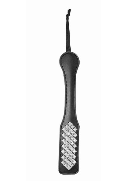 Sportsheets Sex & Mischief Studded Paddle with a smooth vinyl side and studded nickel-free hardware side, designed for versatile BDSM play.

