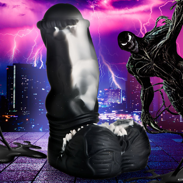 Black and white fantasy silicone dildo with ribbed head, suction-cup base, and spiky balls.

Venom-inspired dildo, fantasy silicone dildo, Creature Cocks Venom, alien rod dildo, ribbed fantasy dildo, suction cup alien dildo, harness-compatible dildo, premium silicone toy, black and white dildo, phthalate-free fantasy toy