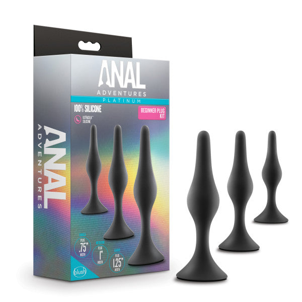 Product shown next to packaging. Three teardrop shaped butt plugs black silicone with flared base.