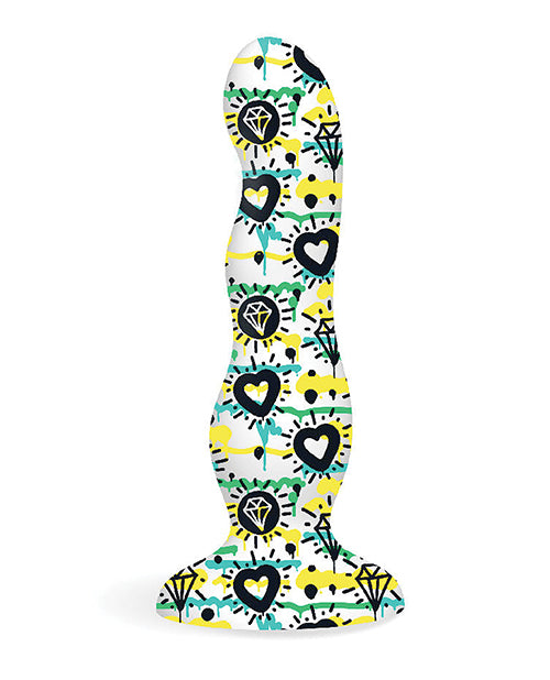Product shown out of packaging. 7 inch dildo with curved tips and ripples. No anatomical features noted. White with prints on it. Print displays diamonds. And hearts with green, yellow and blue graffiti.