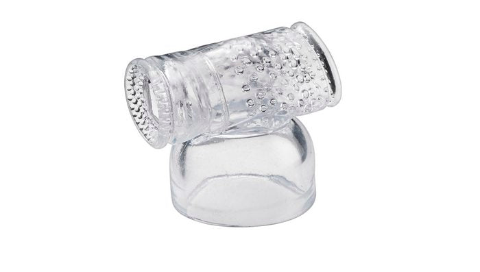 Close up of wand attachment, sleeve for penis. Clear with ridges and bumps inside.
